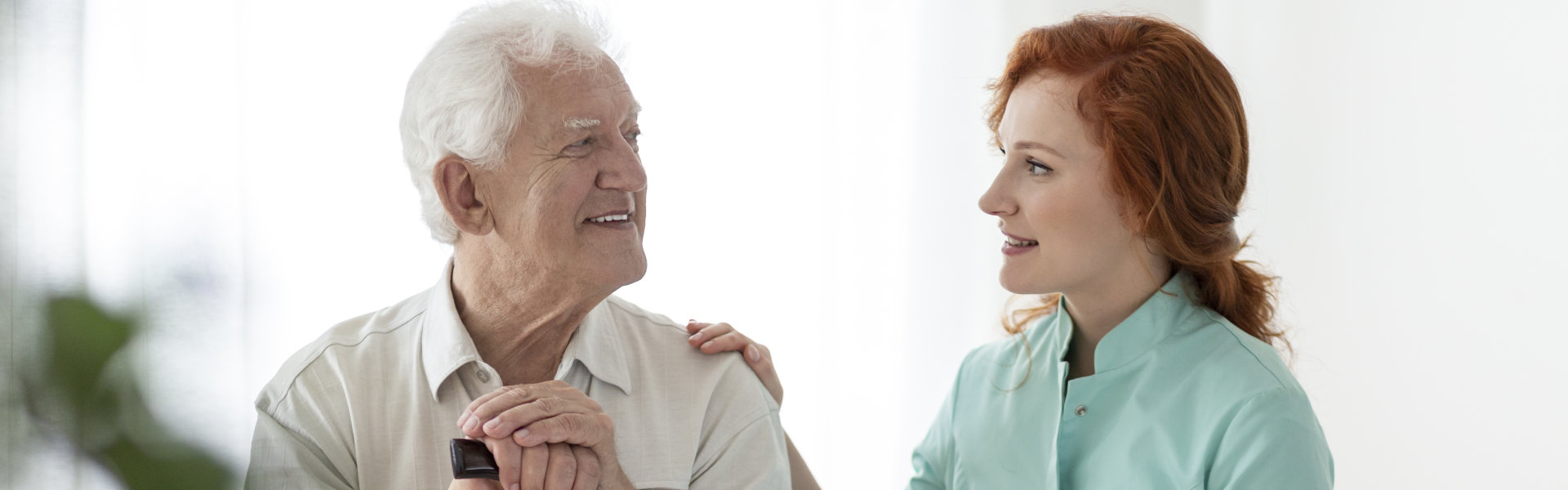 caregiver with senior man
